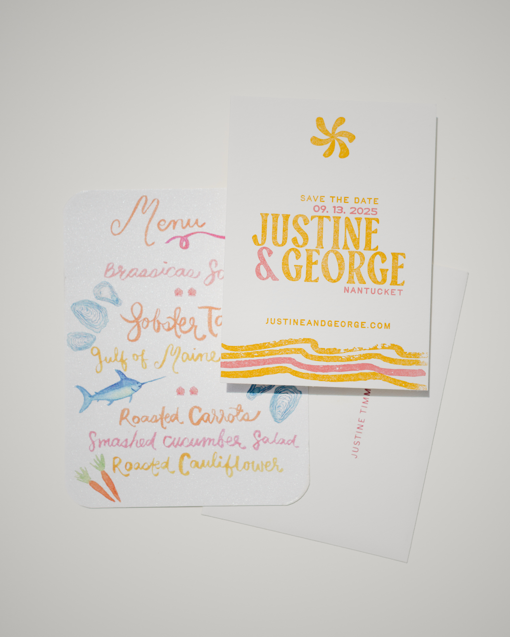 Wedding invitation with menu and 'Save the Date' card on a white background